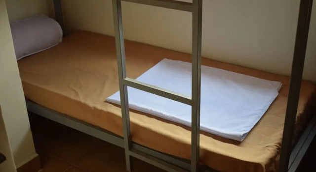 Кровать в общем номере Orison Managua