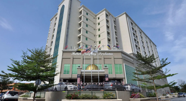 Кровать в общем номере Hotel Taiping Perdana