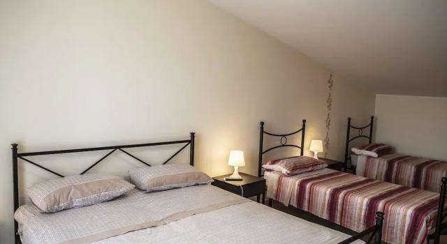 Четырёхместный номер Standard с балконом B&B Caravello