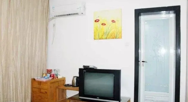Xingzi Kunpeng Holiday Hotel, Book Hotel Hoteller i Jiujiang med parkering, Parkering