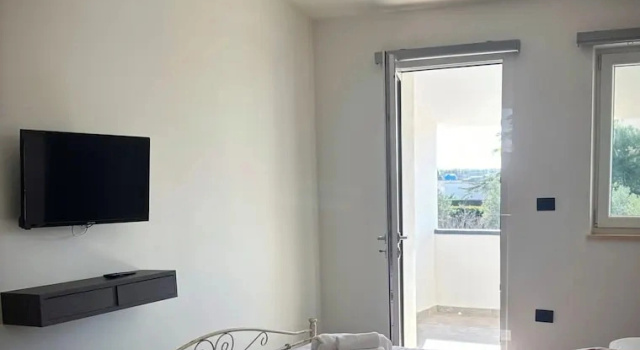 Двухместный номер Deluxe с балконом и с видом на сад B&B Helios