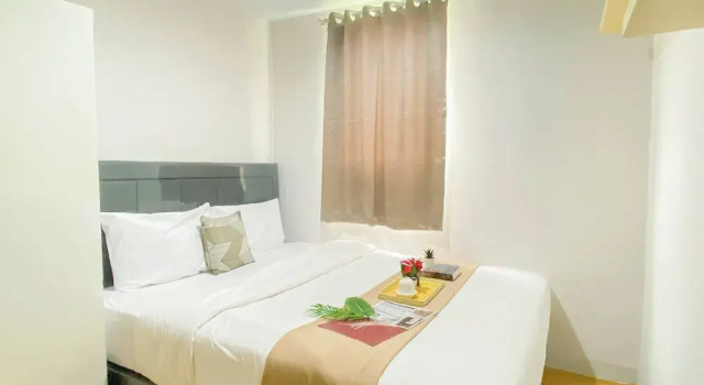 Simple 2Br At Azalea Suites Apartment