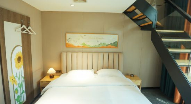 Кровать в общем номере Liuzhou Dingwei Business Hotel (Yaobu Ancient Town)