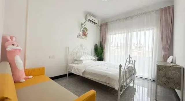 Кровать в общем номере Zhuhai Qi'ao Island Miss Ruo's Courtyard Homestay (Tianhe Street)
