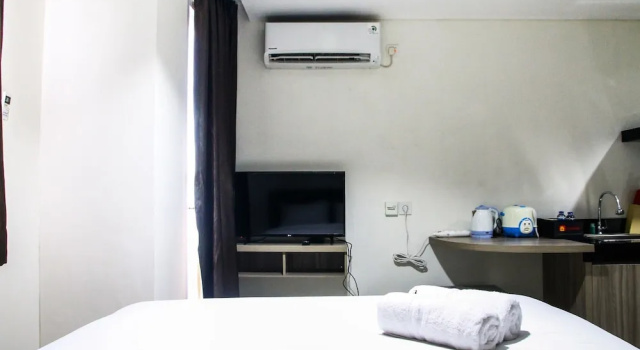 Номер Standard Comfy Studio Room Bintaro Icon Apartment