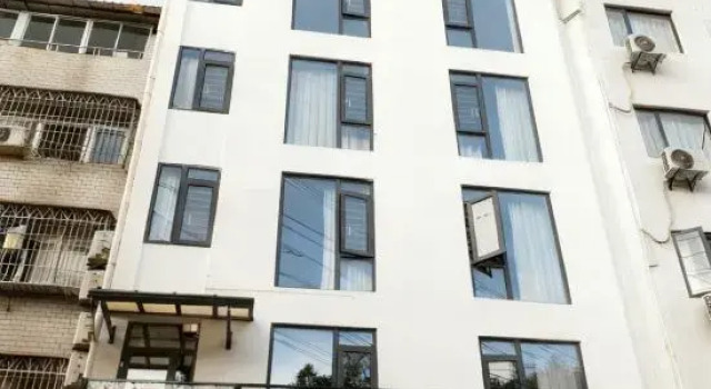Muqi Jiushe Design B&B (Longyan Railway Station Minxi Trading City), Prenota Bed & breakfast Longyan Monte Fuji