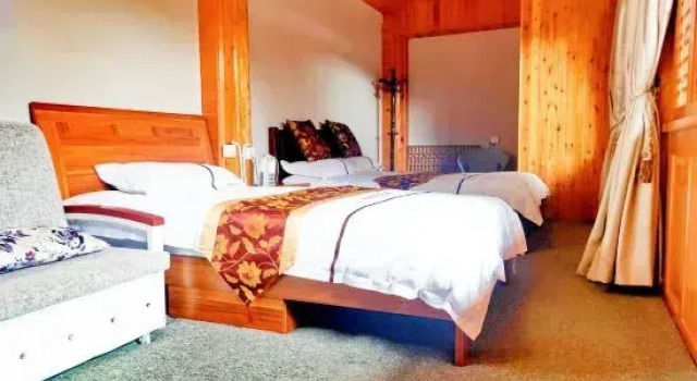 Люкс с 4 комнатами Xiaoyixiongjia Hostel