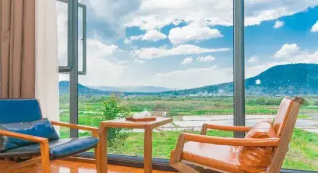 Кровать в общем номере Zhuxiyuan Resort Inn