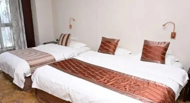 Трёхместный семейный люкс Wendeng Huaxi Hotel