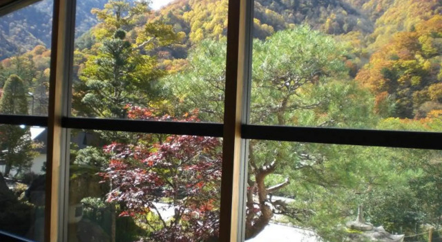 Кровать в общем номере Okada Ryokan Warakutei