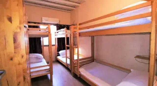 Кровать в общем номере Shaoxing Laotaimen Luxun Native Place Youth Hostel