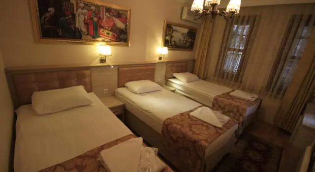 Трёхместный номер Standard Tashkonak Studio Suites