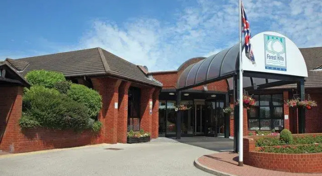 Кровать в общем номере Forest Hills Hotel & Country Club