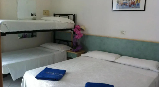 Четырёхместный номер Standard Strand Hotel