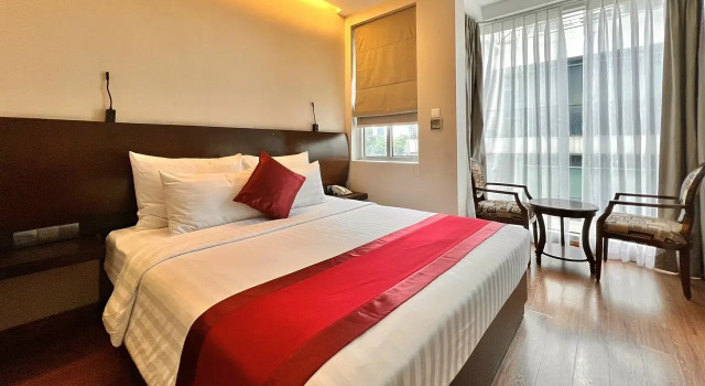 Номер Deluxe M Village Hotel Tao Đàn Park, a brand of Modern Village Lifestyle