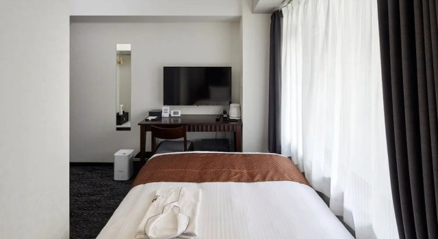 Camera Economy Hotel Briller