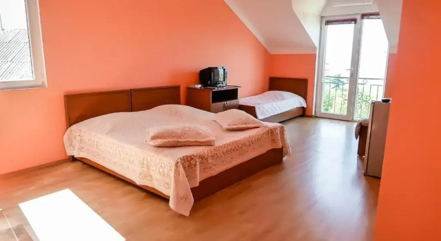 Четырёхместный номер Standard Green Garden Hotel