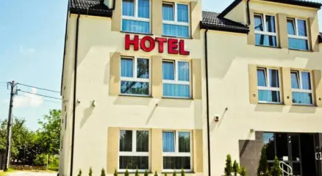 Кровать в общем номере Hotel Sokołowska Airport Modlin