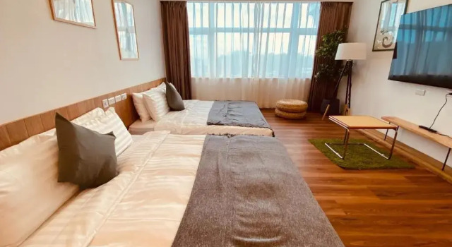 Кровать в общем номере с видом на море Kenting Cozy B&B