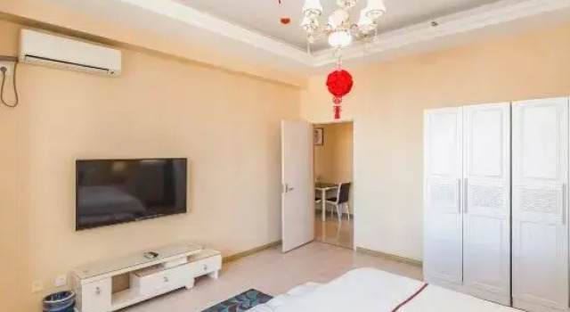 Люкс Deluxe Xingangjing Apartment Hotel(Dalian Harbor Plaza International Conference Center store)