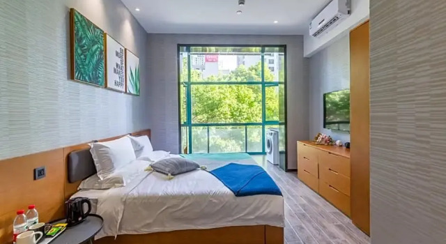 Номер Deluxe Shanghai Moju Hotel