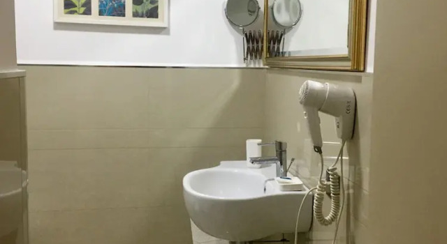 Четырёхместный номер Standard с балконом Sangiuliano114 B&B