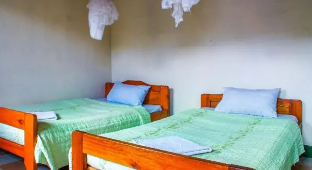 Sabinyo Guest House, Reservar Casa de hóspedes Hotéis no centro de Kisoro, hotéis no centro de Kisoro