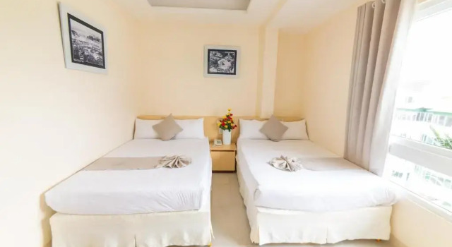 Четырёхместный номер Deluxe с видом на город Ngoc Nguyen Anh Hotel Da Lat