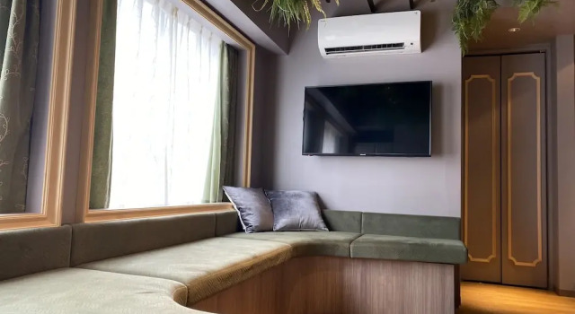 Кровать в общем номере THE WARDROBE Hotel Shimokitazawa