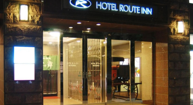 Кровать в общем номере Hotel Route-Inn Yokohama Bashamichi