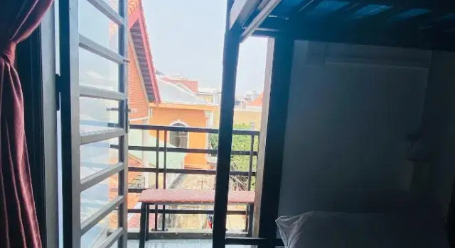 Кровать в общем номере Hue Happy Homestay