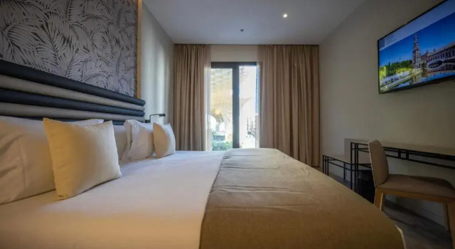 Трёхместный номер Deluxe abba Sevilla