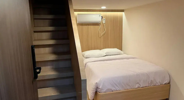 Standard quadruple famille chambre INSAHAUS Guest House