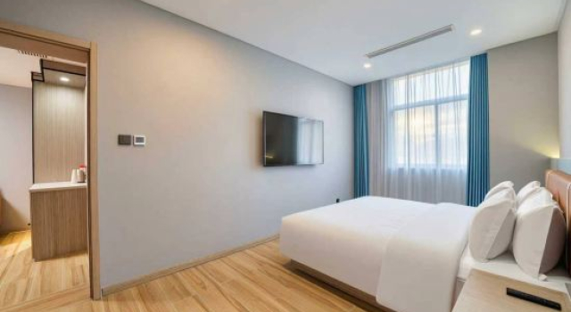 Люкс Deluxe Wanxi Hotel (Qilun Square Subway Station)