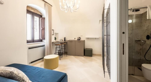 Четырёхместный номер Deluxe с балконом и с видом на город Domus San Giovanni