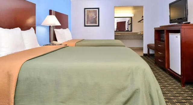 Standard quadruple chambre Executive Inn