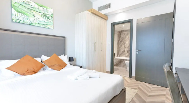 Luxury StayCation - Vibrant 1BR Apartment With Pool and Huge Balcony