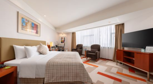 Номер Deluxe Merryland Traders Hotel