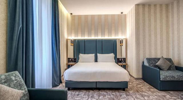 Четырёхместный номер Deluxe CC Palace Hotel