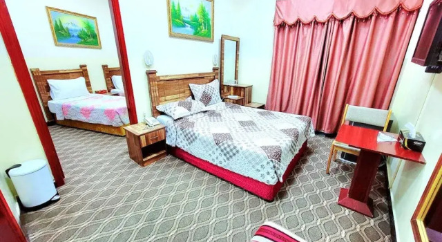 Четырёхместный номер Deluxe с балконом Al Arraf Hotel
