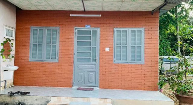 Кровать в общем номере Nam Cat Tien Homestay