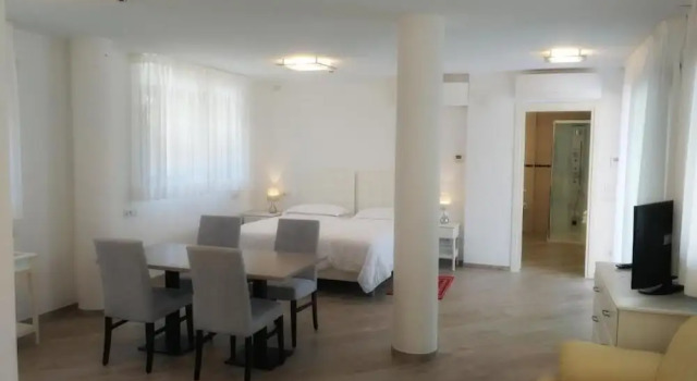 Четырёхместный семейный номер Standard с балконом Hotel & Wellness Fra I Pini
