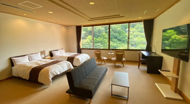 Четырёхместный люкс Yuze Hotel