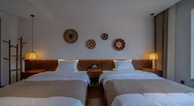 Qichi Inn (Dai Ancient Town), Rezerwuj Hotel Dehong Yunnan
