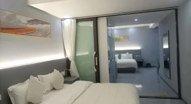 Семейный люкс Мансарда с балконом и с видом на море Haipan Taosheng Hotel Dali Shuanglang