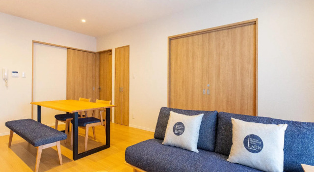 Кровать в общем номере LAPIN MIHAMA Residence Hotel