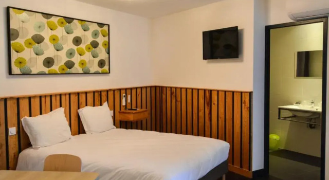 Четырёхместный номер Standard CitHôtel le Relais Boisniard