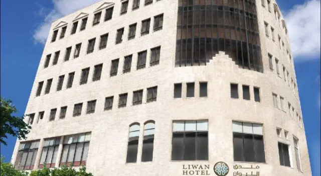 Кровать в общем номере The Liwan Hotel