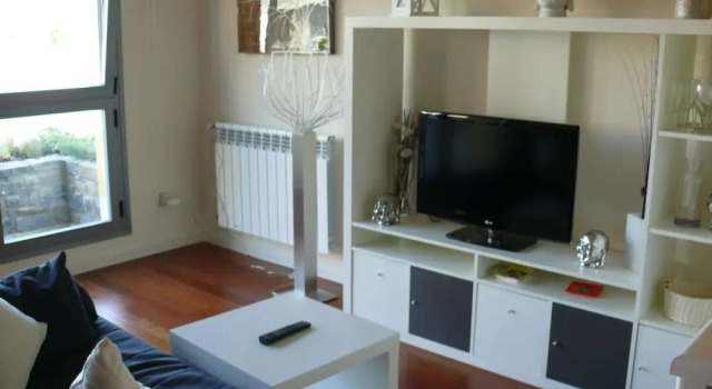 Апартаменты APARTMENTSUITESPAIN FORMIGAL ORDESa