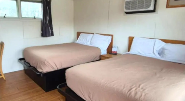 Четырёхместный номер Standard Economy Inn Cadillac MI by Hotel O